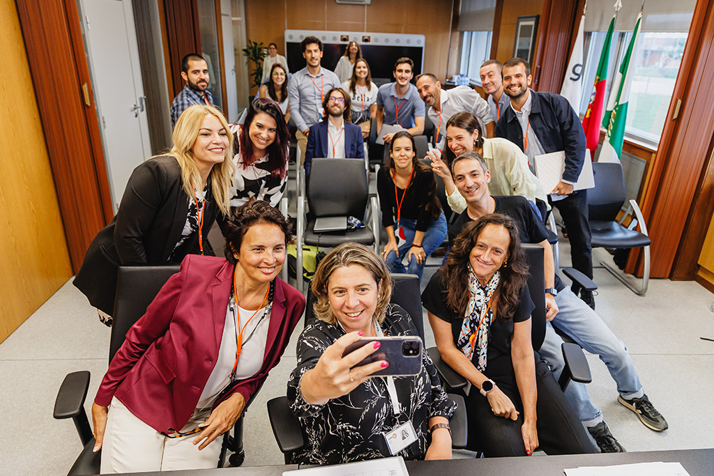 group of participants taking selfie